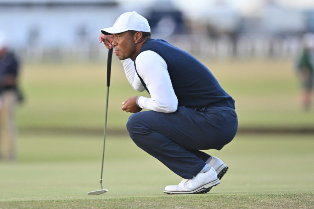 Tiger Woods sinks at the start of the British Open